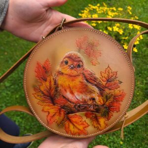 Round bag with a sparrow
